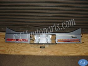 OEM 1985 1986 1987 1988 Cadillac Deville Fleetwood FWD REAR TRUNK BUMPER FILLER PANEL TRIM WITH REFLECTORS #20644831